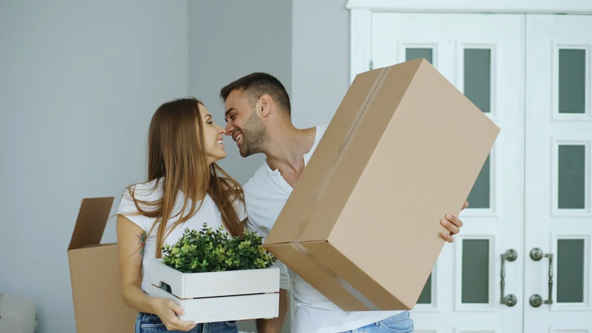 Couple embracing in a newly purchased home after relocating, Florida divorce sale